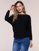 Buzo tejido liviano de calce holgado color celeste, con escote bote y mangas tipo dolman.