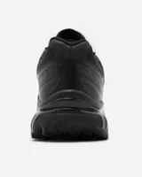 Championes Salomon modelo XT-6, color negro, diseñados para trail running con tecnología de amortiguación y suela de alta tracción. Presentan un sistema de cordones de ajuste rápido y refuerzos en la puntera.