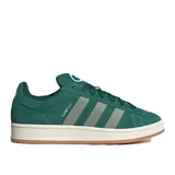 Championes Adidas Campus 00S de gamuza verde oscuro, con las tres franjas características en gris claro y la palabra "CAMPUS" estampada en dorado. Tienen una suela gruesa de goma color crema y cordones a tono.