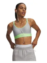 Top deportivo Under Armour de sujeción media, color gris con detalles en verde neón. Presenta tirantes ajustables con logo de la marca y banda elástica inferior con logo central.