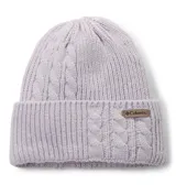 Gorro de lana tejido con diseño de trenzas y canalé, con vuelta y parche de la marca Columbia. Cuenta con forro interior de polar para mayor abrigo.