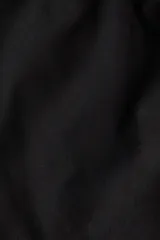 Pantalón negro de lino y viscosa, corte recto, con cintura elástica ajustable con cordón.