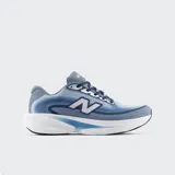 Championes New Balance Ellipse de running, color celeste y azul con entresuela blanca Fresh Foam X y el logo "N" plateado en los laterales.