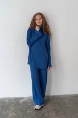 Conjunto de pantalón y blusa color beige, de punto morley.