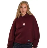 Canguro O'Neill color bordó, con capucha y cordones ajustables. Presenta un estampado frontal con un sol y el logo de la marca, además de un bolsillo tipo canguro y una etiqueta decorativa en la parte inferior.