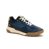 Championes Caterpillar modelo Hex Ready T-Toe para hombre, en color azul marino con detalles en amarillo, blanco y suela de goma marrón. Capellada combinada de cuero, paneles textiles y refuerzos sintéticos, con entresuela de EVA y cordones blancos.
