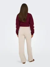 Pantalón jogger para mujer de tiro medio, pierna recta y wide leg, color beige, con cintura elástica y cordón ajustable.