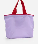 Cartera plegable Renner, color lila con asas y detalles en rojo, estampado frontal con el texto "muchas coisas.".