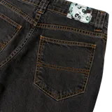 Pantalón jean negro con lavado stonewash, tiro medio, calce suelto y pierna oxford.