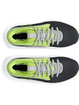 Championes de básquetbol Under Armour modelo Lockdown 7, con diseño bicolor en verde neón y negro. Presentan parte superior de malla transpirable con superposiciones de cuero, entresuela de EVA blanca para mayor amortiguación y suela de caucho con patrón de tracción en espiga.