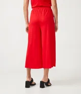 Pantalón pantacourt verde oliva de cintura alta con elástico, bolsillos laterales y lazo ajustable en la cintura.