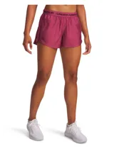 Shorts deportivos Under Armour de tiro bajo, color fucsia, con cintura elástica ancha con logo de la marca y bolsillos laterales.