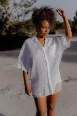 Camisa color naranja de lino 100%, de corte holgado y mangas 3/4.