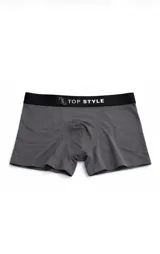 Boxer gris oscuro melange de algodón, con cintura elástica ancha en color negro que presenta la inscripción "TOP STYLE" en blanco.