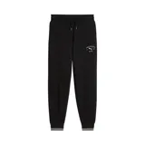 Pantalón de jogging Puma color negro, con cintura elástica ajustable mediante cordón, bolsillos laterales y puños acanalados en los tobillos. Presenta un logo bordado de Puma Athletics en la pierna izquierda.