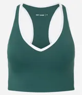 Top deportivo Get Over de microfibra verde oscuro con escote en V y espalda nadador. Presenta bies de color blanco en los bordes y costados.
