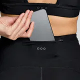 Calza larga de running Saucony Solstice, color negro, con cintura alta y bolsillos laterales.