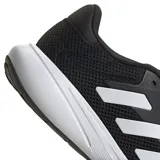 Championes de running Adidas modelo Response Runner U, color negro con las icónicas tres tiras en blanco y suela blanca. Diseño de malla transpirable con cierre de cordones.