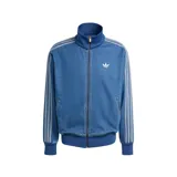 Campera adidas Adicolor Firebird de denim azul, con cierre frontal, bolsillos laterales, cuello alto y las icónicas tres tiras de la marca en las mangas.