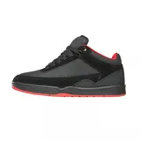 Zapatillas de skate éS Stylus Mid, color negro con detalles en rojo y logo dorado.