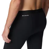 Calza técnica de compresión color negro, diseñada como primera capa térmica. Cuenta con tecnología reflectante para retener el calor corporal y tejido hidroabsorbente para eliminar el sudor. Presenta costuras planas ergonómicas y elasticidad en cuatro direcciones para mayor movilidad.