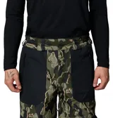 Pantalón de esquí Columbia Coreshot Printed Omni-Tech, impermeable y transpirable, con diseño camuflado en tonos verdes y negro, con refuerzos en zonas clave, bolsillos con cierre y ventilación en las piernas.