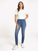 Jeggings de talle alto Tommy Hilfiger de denim azul, con ajuste estilizado y cierre de botón con cremallera.