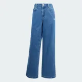 Jean de corte holgado y tiro medio, confeccionado en denim azul. Presenta las icónicas tres tiras de la marca en los laterales y el logo del trébol bordado en la parte frontal.
