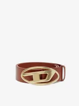 Cinturón Diesel B-1DR W para mujer, confeccionado en cuero vacuno color marrón, con hebilla metálica dorada en forma de la icónica letra "D" de la marca.