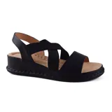 Sandalias bajas color beige con plataforma, tiras cruzadas elásticas y plantilla acolchada.