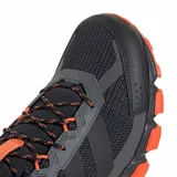 Championes de trail running Adidas Terrex Rockadia M para hombre, en color negro con detalles en naranja y suela de gran tracción.