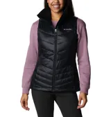 Chaleco acolchado Columbia en color negro, con cierre frontal completo, cuello alto forrado en vellón y bolsillos laterales con cierre. Presenta tecnología Omni-Shield que repele la humedad y aislamiento térmico sintético.