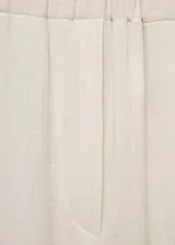 Pantalon wideleg de tiro alto, confeccionado en tejido de bambula de algodón. Presenta cintura elástica y bolsillos laterales.