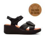 Sandalias de cuero negro Usaflex Celie con plataforma y ajuste con velcro.