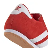 Championes Adidas Taekwondo Lace W, color rojo con las tres tiras blancas características de la marca. Suela de goma color caramelo.