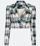 Blazer cropped con estampado de cuadros en tonos verde, blanco y marrón. Tiene cuello solapa, manga larga abullonada y cierre abotonado frontal.