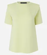 Blusa amarilla de algodón con cuello redondo, mangas cortas y hombreras.