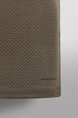 Musculosa técnica de Zara Athleticz, diseñada como primera capa, confeccionada en tejido elástico con textura microperforada, transpirable y termorreguladora, con cuello redondo y diseño sin costuras.