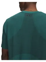 Remera deportiva Under Armour Vanish Seamless SS de manga corta y cuello redondo, color verde, con diseño sin costuras y paneles de malla para mayor transpirabilidad.