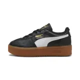 Championes Puma Palermo Elevata de cuero negro con franja lateral blanca, detalles dorados y suela marrón de plataforma.