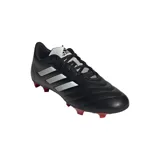 Championes de fútbol Adidas Goletto VIII, color negro con las icónicas tres tiras blancas en los laterales y suela con tapones rojos.