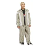 Campera Adidas Originals de estilo deportivo, color beige con paneles blancos en el pecho y mangas. Presenta cierre frontal, cuello alto y las icónicas tres tiras de la marca en los hombros.