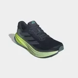 Championes de running Adidas Supernova Rise 2 para hombre, color negro con malla en la parte superior y detalles en verde lima fluorescente en la entresuela Dreamstrike+. La suela exterior es de color azul claro.