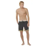 Short de baño Rip Curl modelo Aots Ty Williams, color negro con cintura beige y estampado abstracto en tonos ocre en la parte inferior.