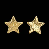 Aros de bronce en forma de estrella con textura irregular.