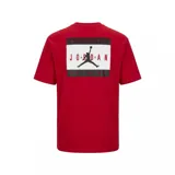 Remera de algodón color negro, con cuello redondo y mangas cortas. Presenta un parche rectangular en el pecho con el logo de Jordan y la inscripción 'Authentic by Nike'.