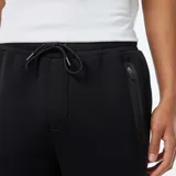 Pantalón de jogging negro de corte recto con bolsillos laterales con cierre.