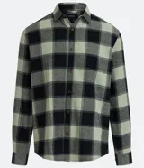 Camisa de manga larga con estampado de cuadros en tonos gris y negro, cuello camisero y abotonadura frontal. Corte regular.