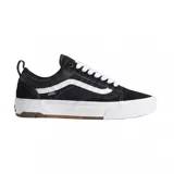 Championes Vans modelo Skate Old Skool con tecnología Wafflecup, color negro con detalles en blanco. Presentan una combinación de materiales en la capellada, cordones blancos, la icónica banda lateral de Vans y una suela de goma resistente con diseño de waffle.