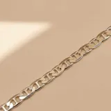 Pulsera de cadena estilo grumet barco, confeccionada en plata 925, con eslabones planos y entrelazados.